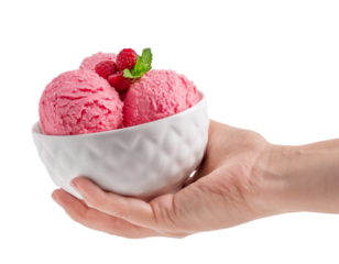 Hand holding bowl with three scoops of sweet homemade organic berry pink ice cream or sorbet made of raspberry decorated with fresh green mint leaf isolated on white background used as dessert