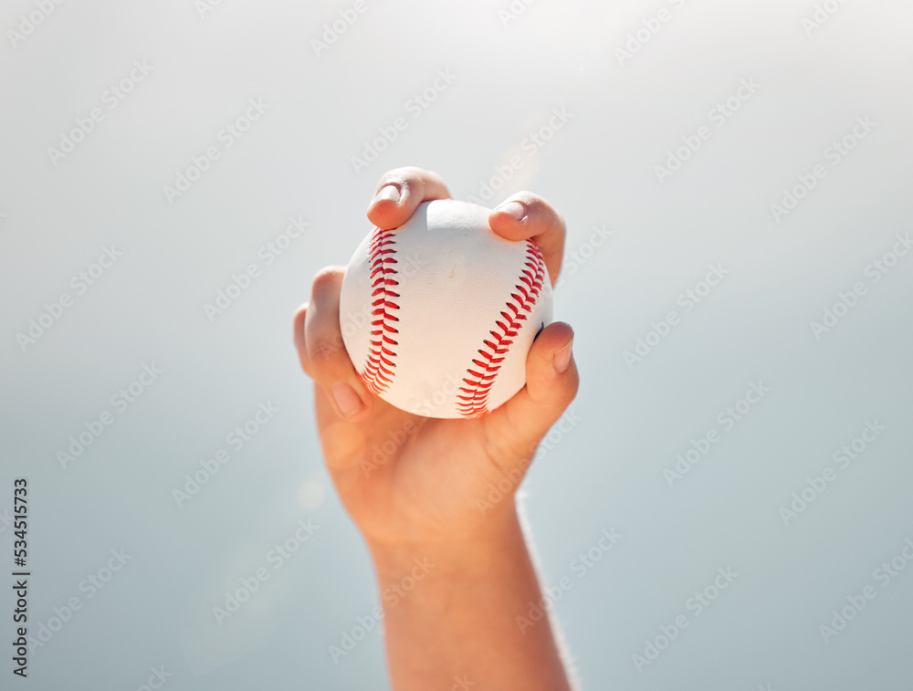 Poster Baseball, athlete hands and ball sports while showing grip of pitcher against a clear blue sky. Exercise, game and softball with a professional player ready to throw or pitch during a match outside