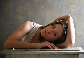 Portrait of young cute girl in studio
