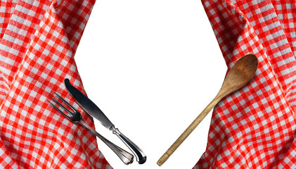Close-up of a red and white checkered tablecloth with silver cutlery (fork and knife) and wooden...