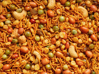 Bombay mixture - an Indian savoury snack made of gram flour-mixed with dry fruits and nuts..