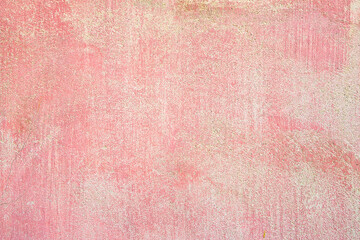 Fototapeta premium Old rough plaster background with red color washed away by the rain