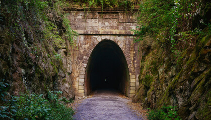 Wide angle of historic old railroad tunnel in VA mountains