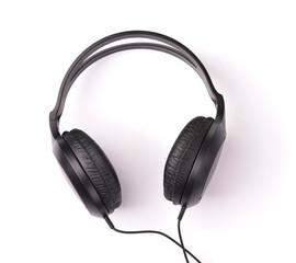 Fototapeta na wymiar Top view of black professional over-ear wired headphones