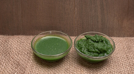 Neem leaves used as ayurvedic medicine with ground neem paste and juice Used in skin care, beauty products and creams.