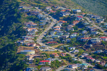 Fototapeta na wymiar Kamehame Drive residential neighborhood in the east suburbs of Honolulu on O'ahu island - Upscale houses built on the slopes of a polynesian volcano