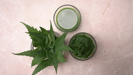 Neem leaves used as ayurvedic medicine with ground neem paste and juice Used in skin care, beauty products and creams.
