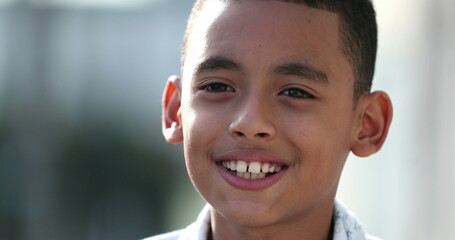 Happy hispanic black latin kid. child boy portrait south america