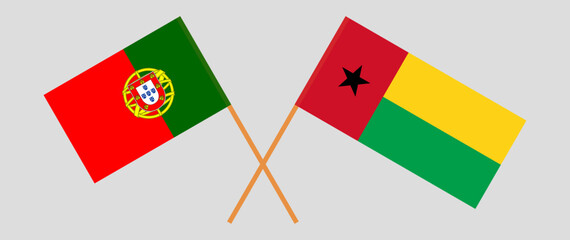 Crossed flags of Portugal and Guinea-Bissau. Official colors. Correct proportion
