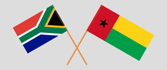 Crossed flags of South Africa and Guinea-Bissau. Official colors. Correct proportion