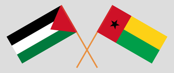 Crossed flags of Palestine and Guinea-Bissau. Official colors. Correct proportion