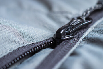 Iron zipper close up view, needlework concept.