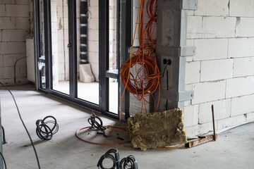 Electrical wiring work at a construction site. Wire extension.