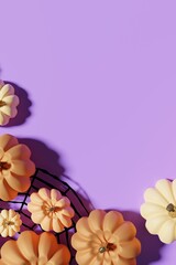 Obraz premium 3d render of orange pumpkins flat lay on a purple background with spider web and copy space