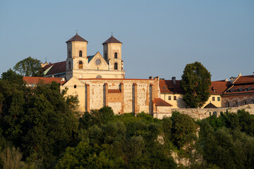 the western frontage of the Benedictine abbey in Tyniec in the evening time