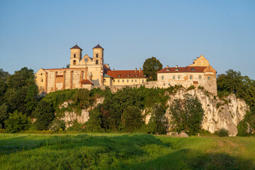 Fototapeta na wymiar the western frontage of the Benedictine abbey in Tyniec in the evening time