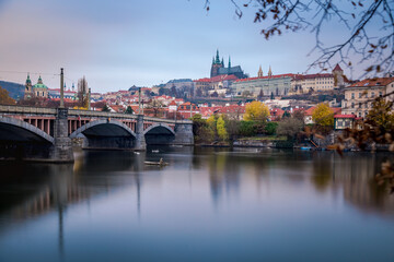 Fototapeta na wymiar Manesuv bridge at dawn with fishermen, Medieval Prague, Czech Republic