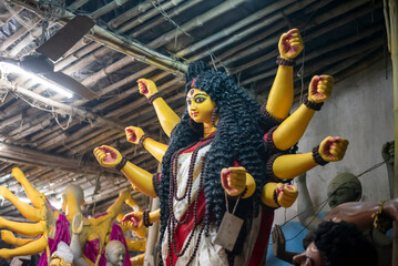 Obraz na płótnie Canvas Close-up of Hindu idol goddess Durga ready to go puja mandap