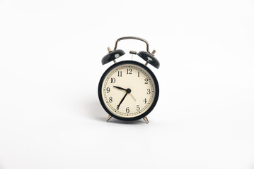 Fototapeta na wymiar black vintage alarm clock isolated on white background, Time concept, 9:35 o'clock. Morning, reminder.