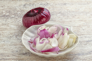 Sliced red onion in the bowl