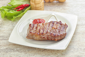 Grilled rib-eye steak beef meat
