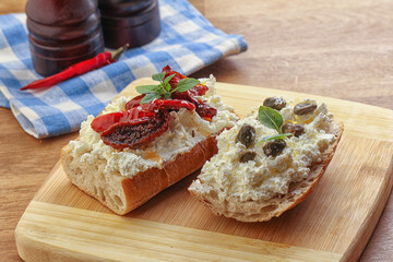 bruschetta with soft cheese capers and tomato
