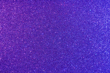 Background with sparkles. Backdrop with glitter. Shiny textured surface. Dark violet