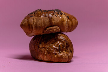 croissant on pink background
