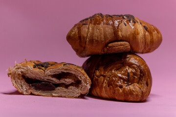 croissant on pink background