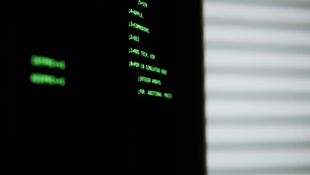 Retro pc with loading code console, programmer making scripts, green basic screen, Old computer studio close-up, Desktop vintage retro wave display, late 90s PC.