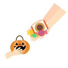 ハロウィンでお菓子をもらう子供の手もと