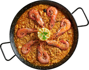 Seafood paella in the pan with prawns