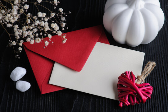 Mock-up card with red envelope and heart