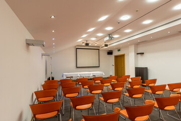 Interior of a room for presentations full of chairs