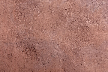 background of red painted wall in sandstone style