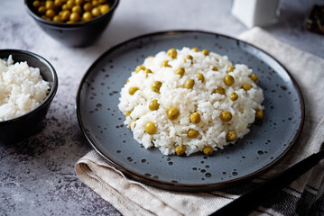 Onion green peas rice in a plate