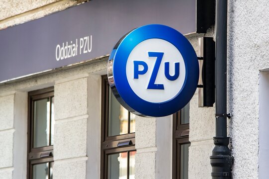 Oddzial PZU insurance company banner in Poland above the entrance to one of its offices