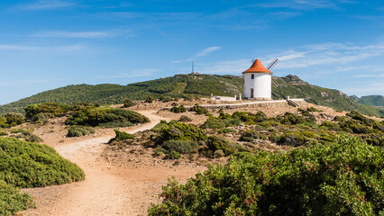 Fototapeta na wymiar Moulin Mattei, an ancient renovated windmill at the northern tip of Cap Corse in Corsica