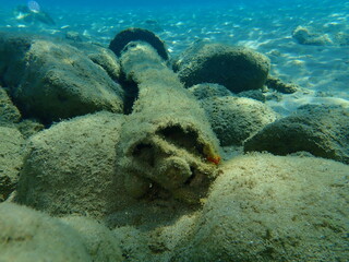Plaster column on the seabed, Aegean Sea, Greece, Halkidiki. Sea pollution.