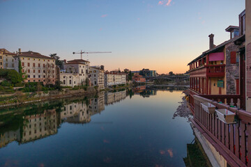Beautiful view on Bridge of Bassano del Grappa, during sunset, Vicenza, Veneto.  