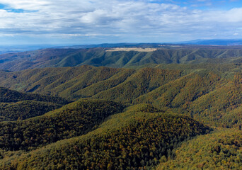 Aerial landscape of a forested mountain area in the Carpathian mountains