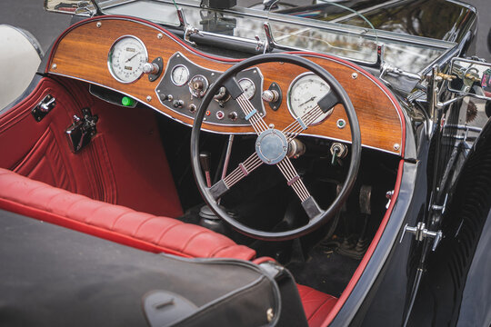 Interior, dashboard and right hand drive of a vintage or retro car from the 1920's and 30's. Typical UK right hand drive. Convertible car or with removable roof.