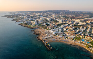 Fototapeta na wymiar Coastline of touristic village of Pernera, Protaras Cyprus. Drone aerial scenery of holiday resort