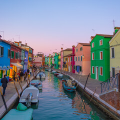 Fototapeta na wymiar View on colorful Burano's lagoon in a winter day during sunset. Burano, Venice, Italy