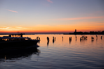 Beautiful frame of sunset from Burano island. Venice, Veneto, Italy. 