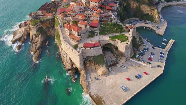Aerial video. Slowmotion shot of the old town of the city of Ulcinj, a coastal town in the southern part of Montenegro. Travel destinations of Montenegro