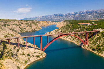 Maslenica Bridge Most in Croatia. The Maslenica Bridge is a deck arch bridge carrying the state road spanning the Novsko Zdrilo strait of the Adriatic Sea