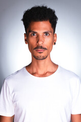 Authentic Portrait - Handsome Black Man Making Expressions with White Shirt Isolated