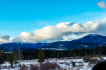 Clouds hang over the foothills. Sibbald Creek Trail, Alberta, Canada