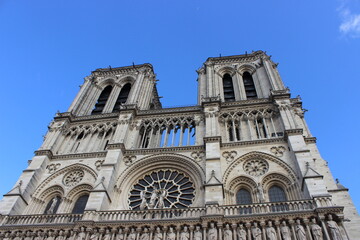 Fototapeta na wymiar Notre Dame Cathedral from the outside. Notre Dame in perfect shape before the fire. Notre Dame on a beautiful sunny day 